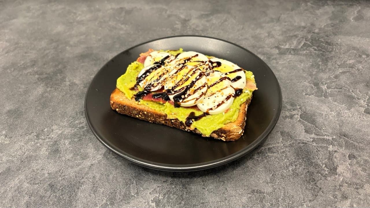 Avocado toast with soft-boiled egg and balsamic drizzle at The LOCAL Place