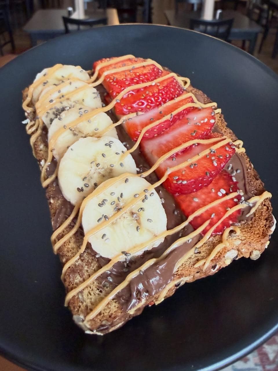 Nutella toast with fresh strawberries and banana at The LOCAL Place