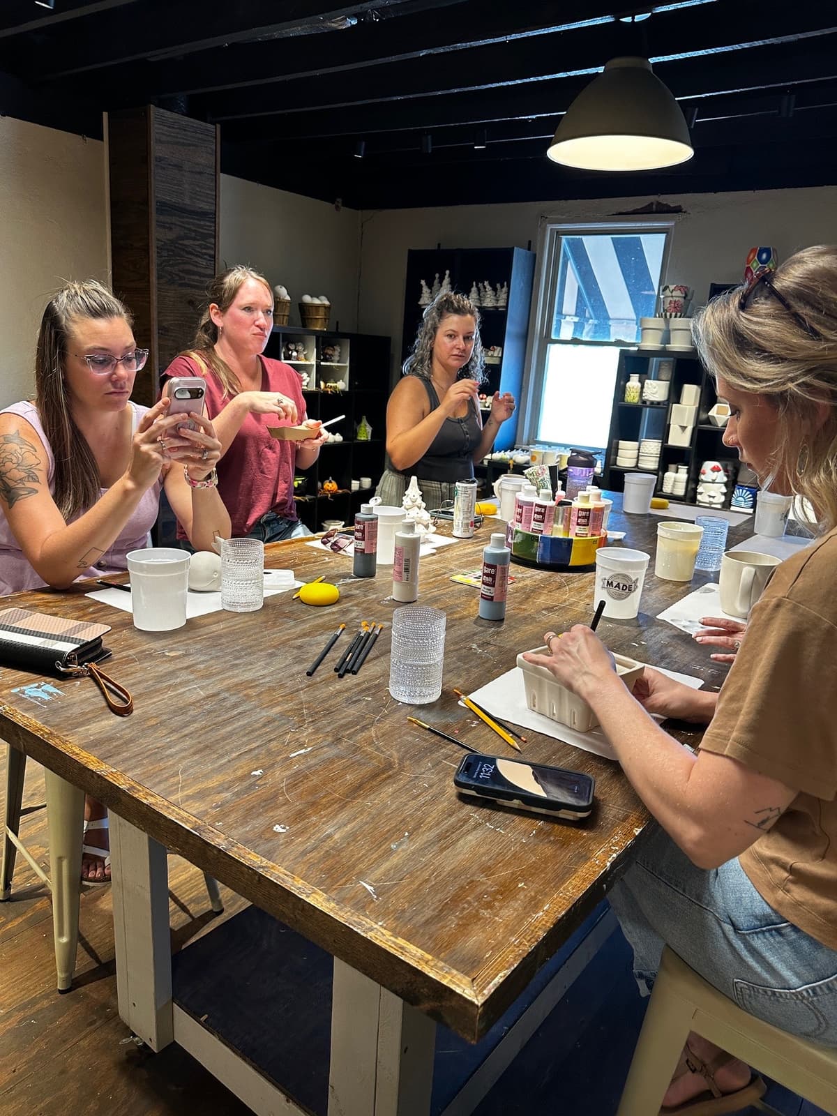 Bachelorette group painting pottery at MADE @ The Local in Centerville TN